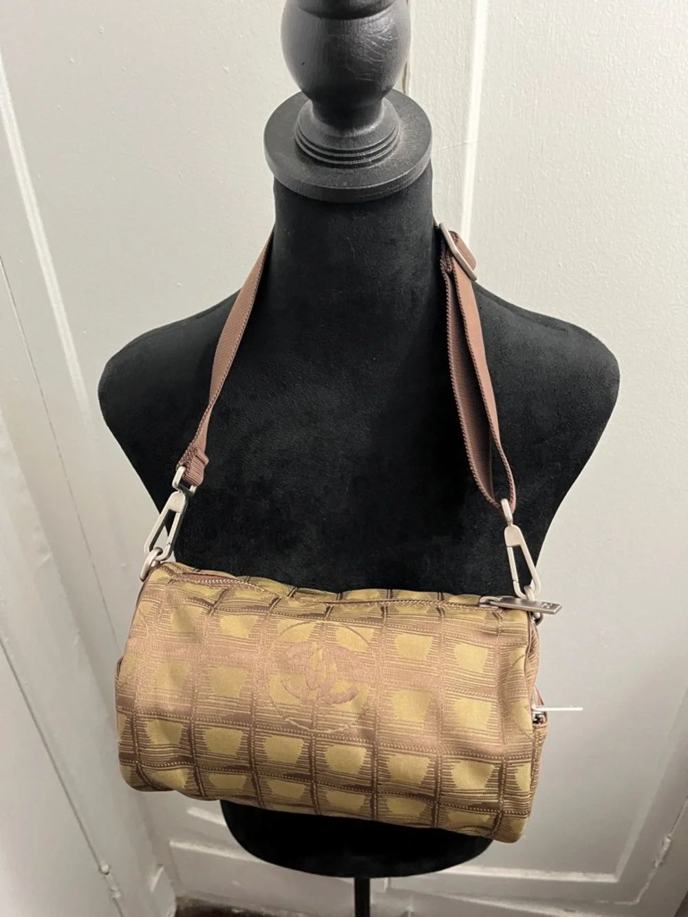 Chanel New Travel Line Mini Roll or Barrel Bag in a khaki or olive green color
